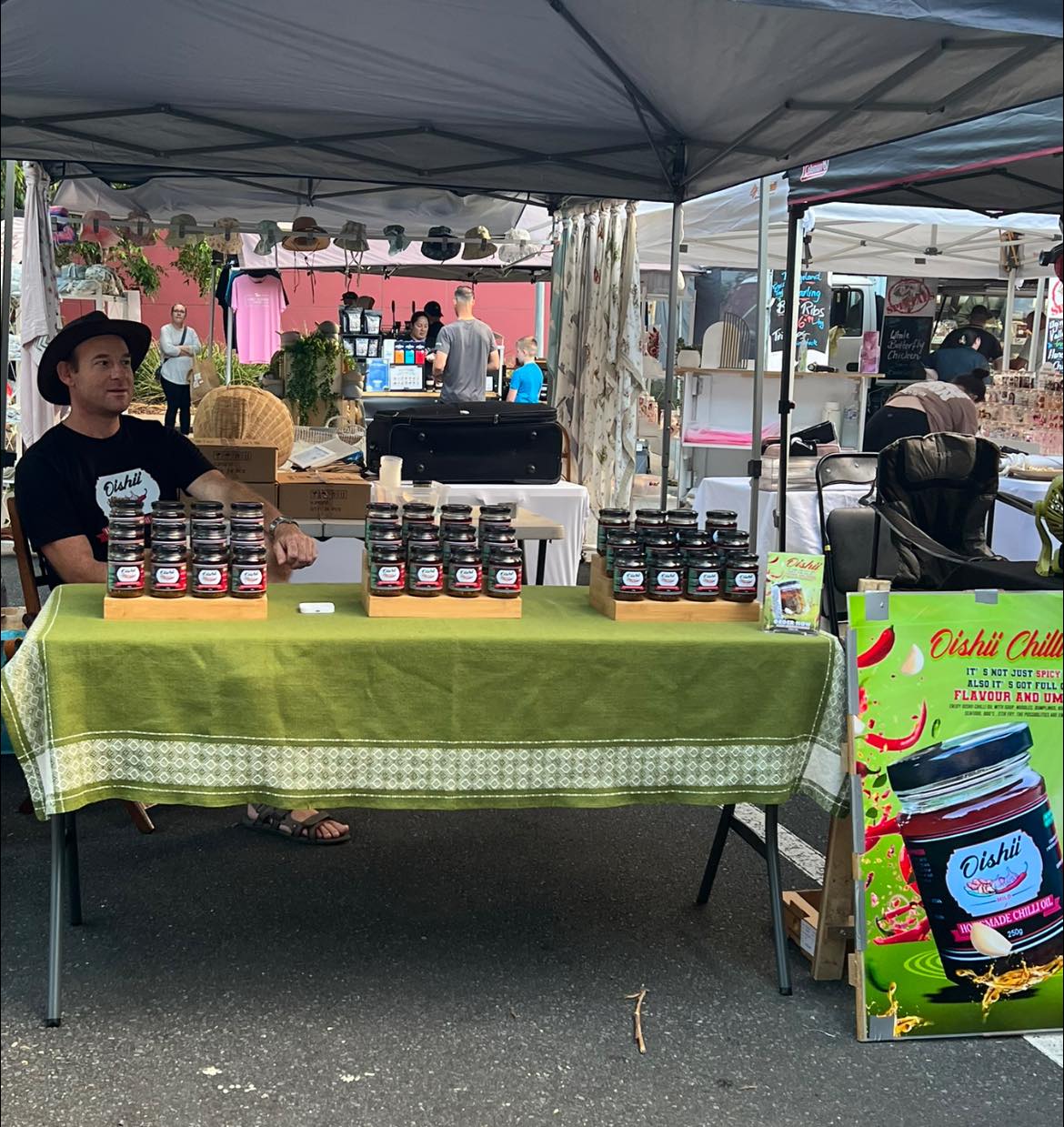 Happy customer with a jar of Oishii